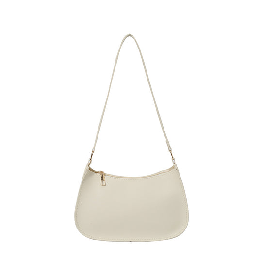 Damen Handtasche mit abgerundeter Silhouette und goldenen Akzenten Nord Taschen