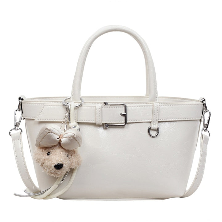 Damen Handtasche mit plüschigem Tieranhänger Nord Taschen