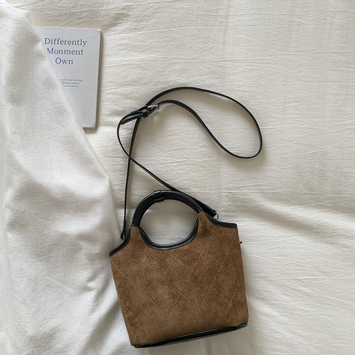 Damen elegante Handtasche mit hochwertigen Wildleder- und Lederakzenten Nord Taschen
