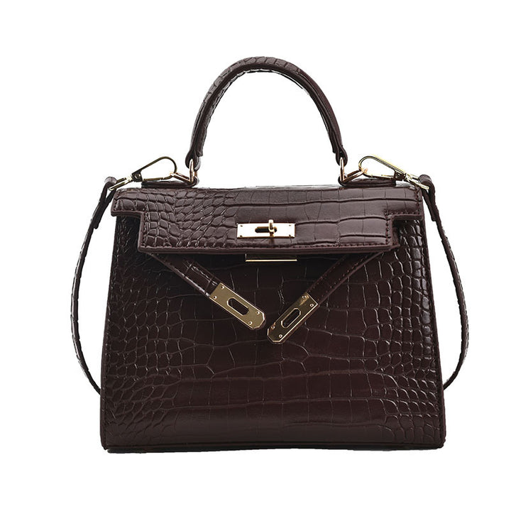 Damen Handtasche im luxuriösen Krokodil-Look mit goldenen Details | Nord Taschen