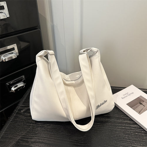 Damen Umhängetasche mit eleganter Struktur und Filterverschluss Nord Taschen