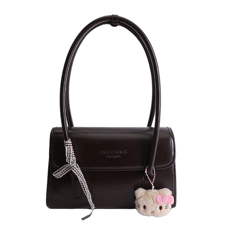 Damen elegante Handtasche mit verspieltem Stoffanhänger Nord Taschen