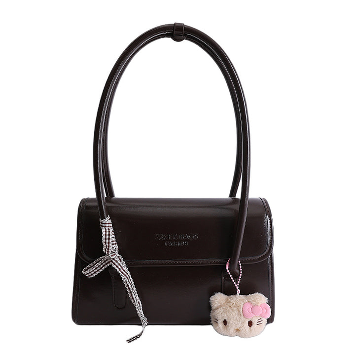 Damen elegante Handtasche mit verspieltem Stoffanhänger Nord Taschen