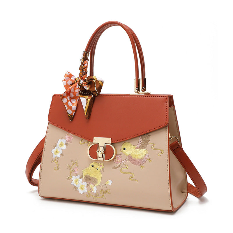 Damen Handtasche mit floraler Stickerei und modischem Schal Nord Taschen