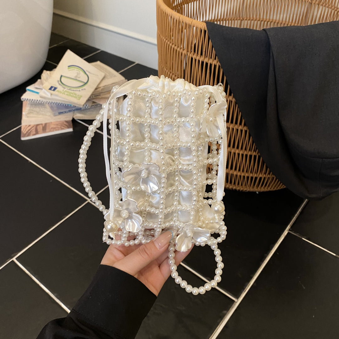 Damen Perlenbesetzte Clutch mit floralem Design Nord Taschen