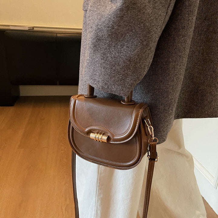 Damen Mini-Umhängetasche aus hochwertigem Kunstleder mit elegantem Klappenverschluss Nord Taschen