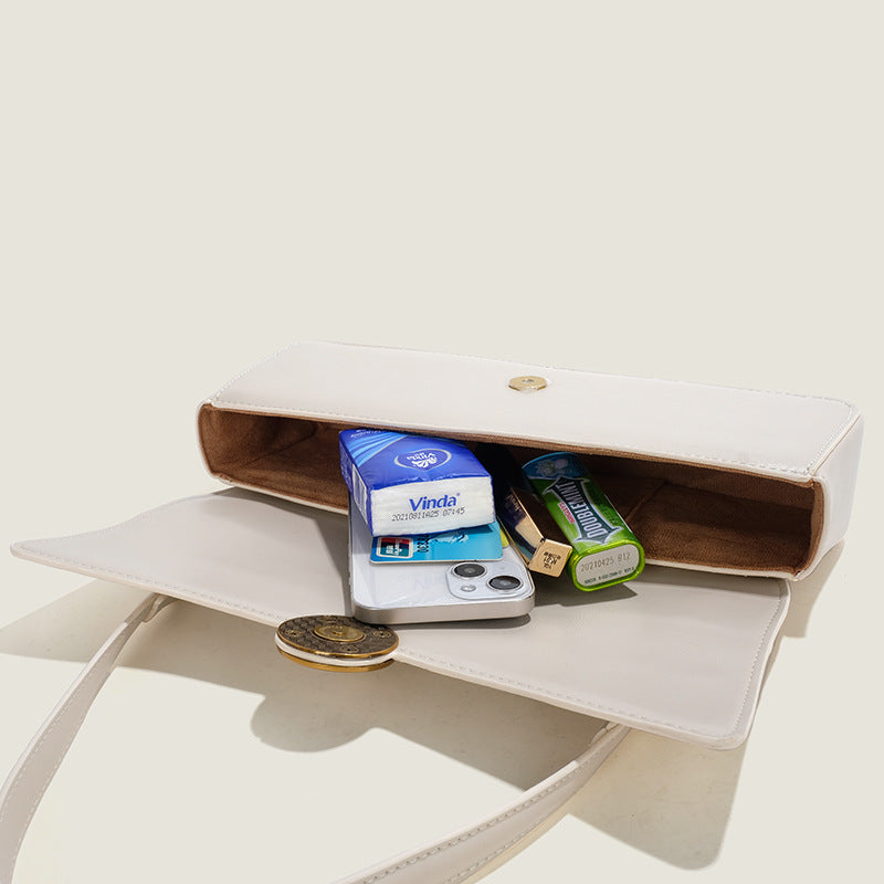 Damen Umhängetasche mit elegantem Druckverschluss und luxuriösen Goldakzenten Nord Taschen