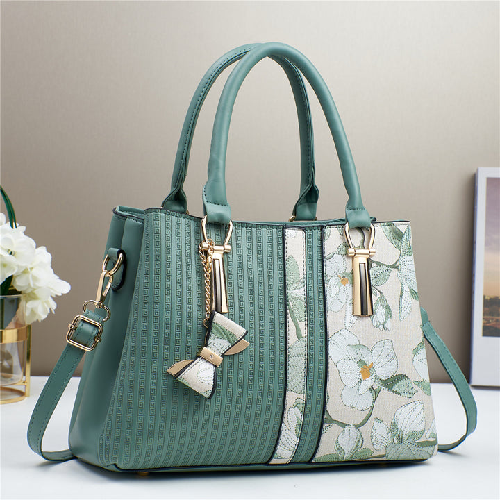 Damen elegante Handtasche mit floralen Akzenten Nord Taschen
