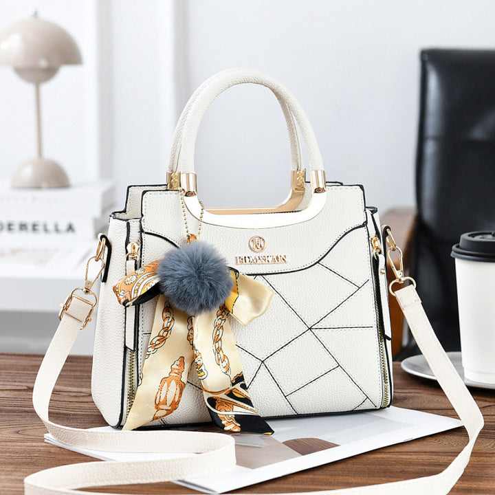 Damen elegante Handtasche mit abnehmbarem Schleifen-Anhänger Nord Taschen
