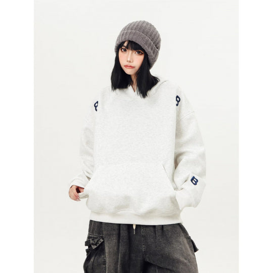 Unisex Oversized Kapuzenpullover mit großflächigem Intarsien‑Blockprint und geripptem Saum Nord Taschen