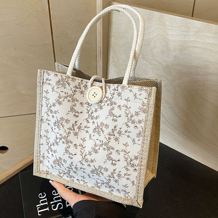Damen Handtasche mit floralem Design und robusten Griffen Nord Taschen