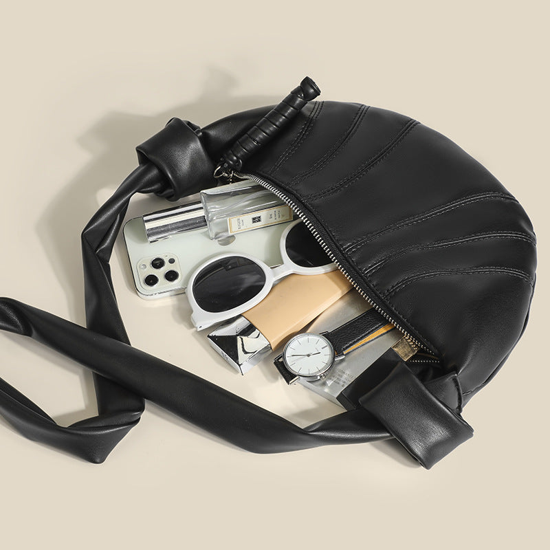 Damen modische Umhängetasche mit innovativem Design und geschwungenem Schnitt Nord Taschen