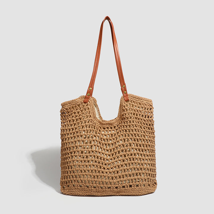 Damen Handtasche aus gewebtem Naturmaterial mit eleganten Lederakzenten Nord Taschen