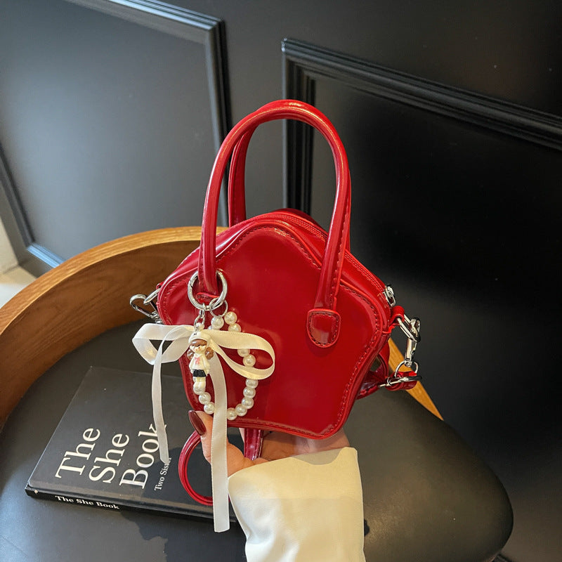 Damen modische Handtasche mit verspieltem Anhänger Nord Taschen