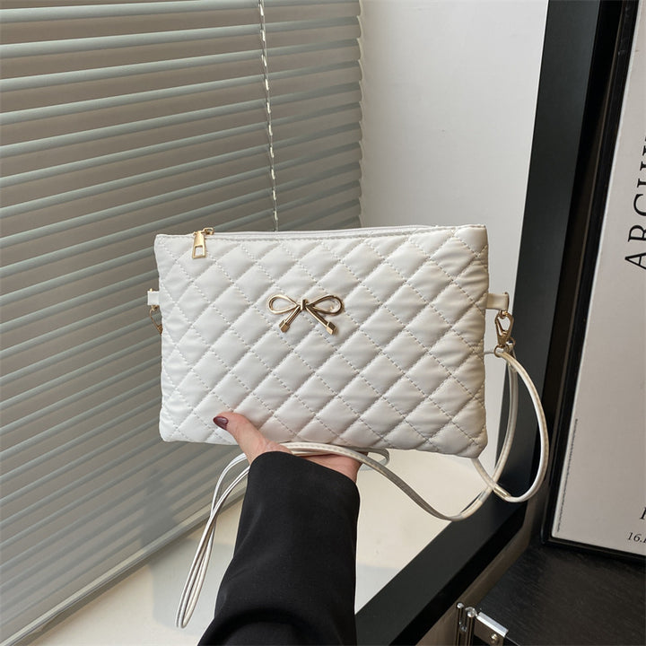 Damen elegante Clutch mit elegantem Steppmuster und zierlichem Schleifenakzent Nord Taschen
