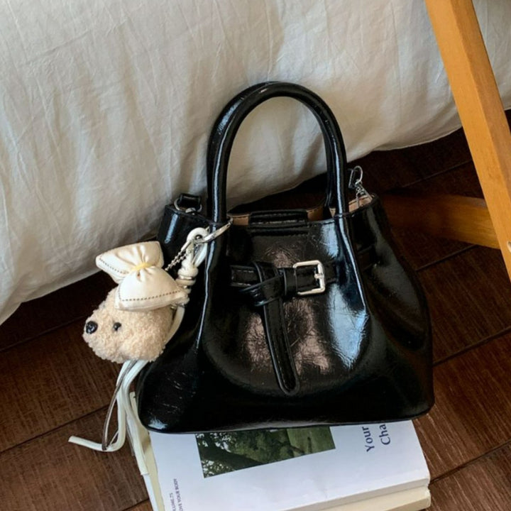 Damen praktische Handtasche mit verspieltem Tieranhänger Nord Taschen