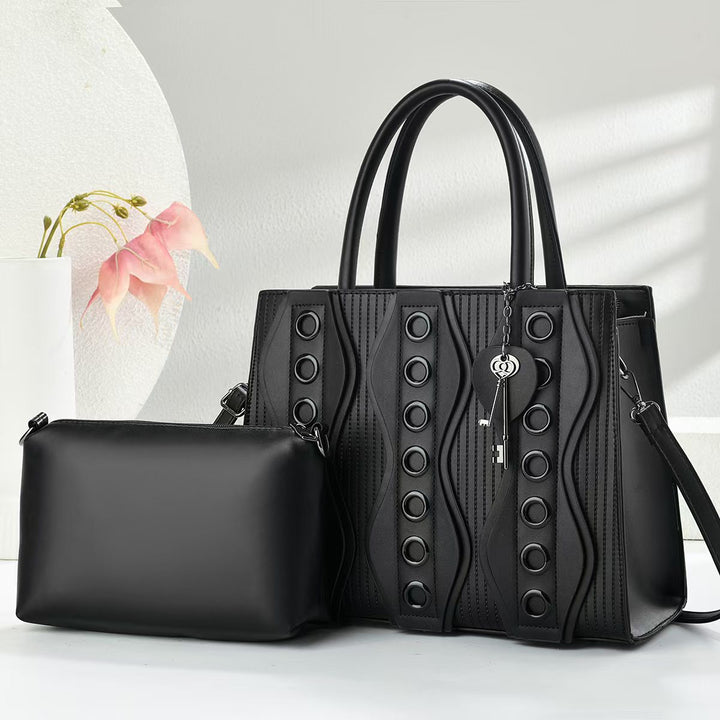 Damen elegante Handtasche mit dekorativen Details Nord Taschen