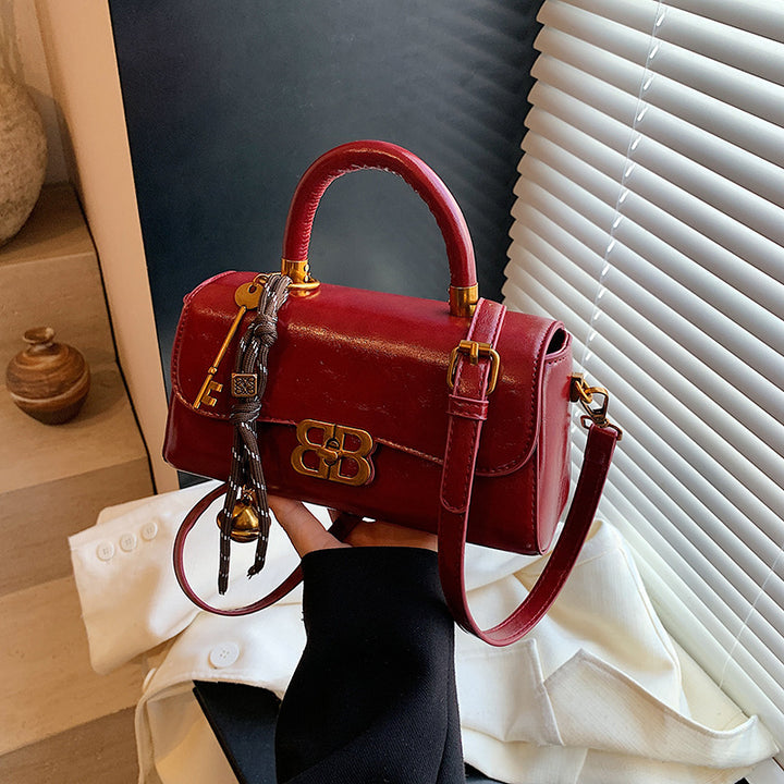 Damen elegante Umhängetasche mit verspieltem Anhänger Nord Taschen