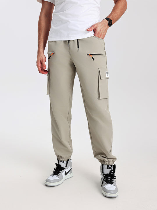 Herren konisch geschnittene Utility-Cargohose im Joggerstil mit Tunnelzugbund, Reißverschlusstaschen & elastischen Beinabschlüssen Nord Taschen
