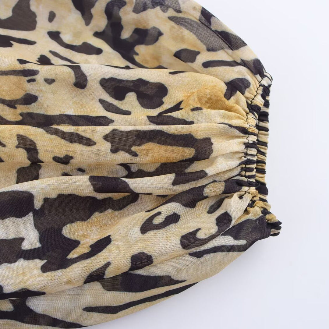 Damen Asymmetrische Wickelbluse mit Leopardenmuster, V-Ausschnitt, Ballonärmeln und Taillengürtel Nord Taschen