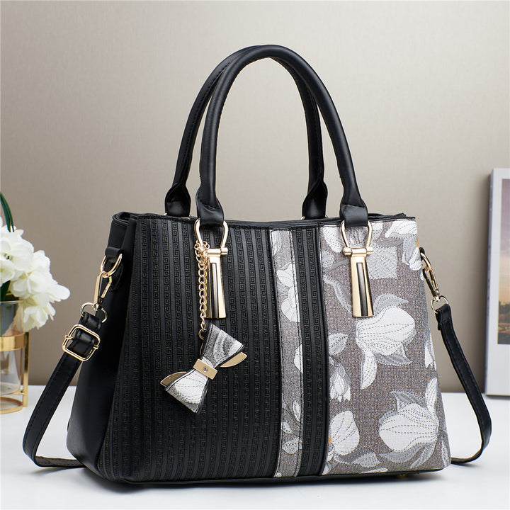 Damen elegante Handtasche mit floralen Akzenten Nord Taschen