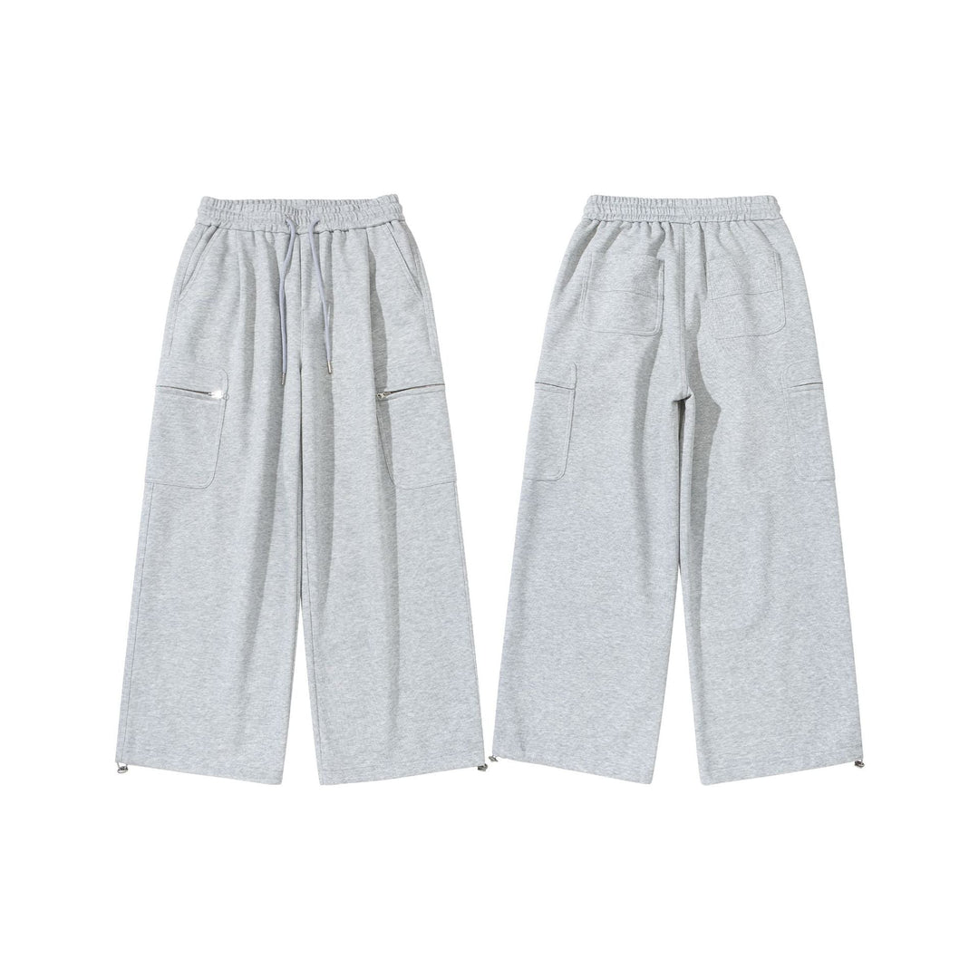 Damen Weite Cropped-Sweathose mit Tunnelzug, Cargo-Taschen und Reißverschluss-Details Nord Taschen
