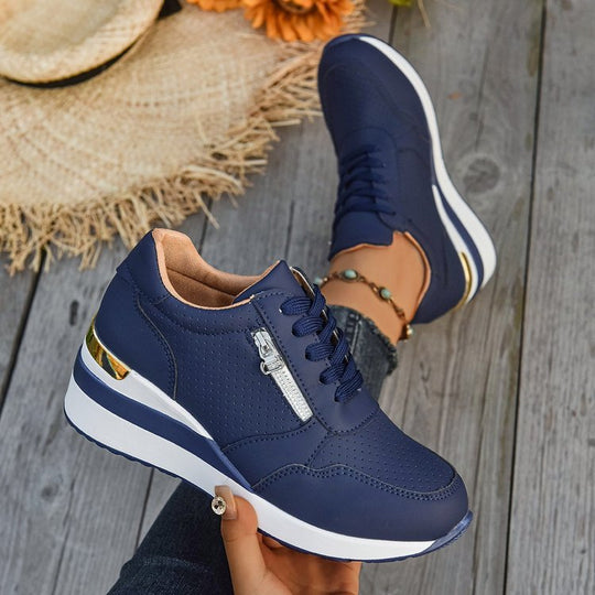 Damen nan Keil-Sneaker mit seitlichem Reißverschluss, perforiertem Obermaterial und ergonomischem Plateau-Fußbett Nord Taschen