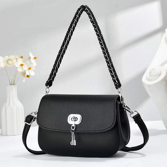 Damen elegante Umhängetasche mit strukturierter Oberfläche und geflochtenem Schulterriemen Nord Taschen