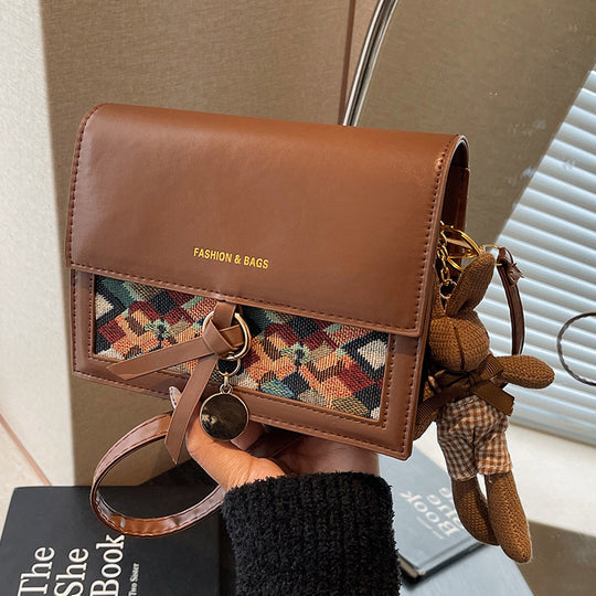 Damen Umhängetasche mit elegantem Knotenverschluss und floralem Muster Nord Taschen