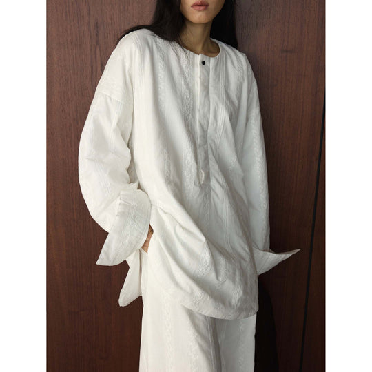 Damen Oversized strukturierte Longbluse mit Rundhals und verlängertem Saum Nord Taschen