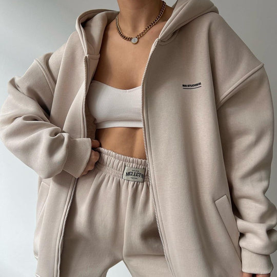 Damen Oversize Kapuzen-Sweatjacke mit Reißverschluss und High-Waist Jogginghose Set Nord Taschen