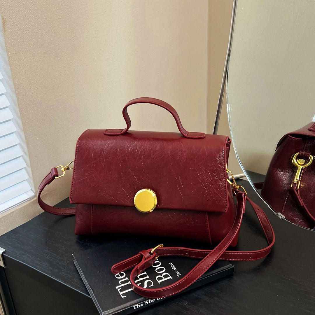 Damen elegante Handtasche mit praktischem Klappverschluss Nord Taschen