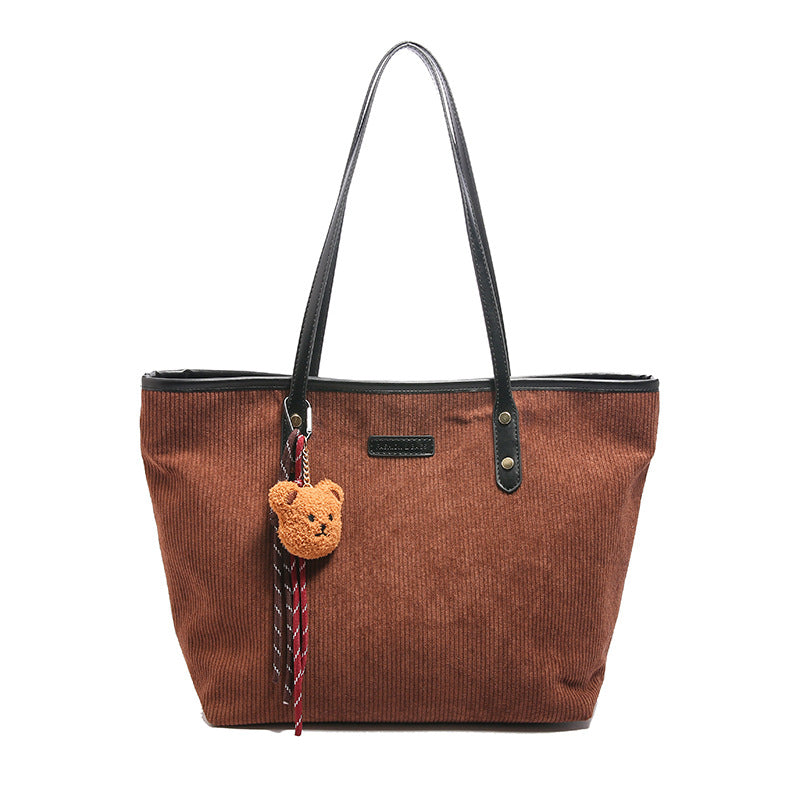 Damen elegante Tragetasche mit verspieltem Anhänger Nord Taschen