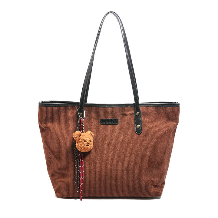 Damen elegante Tragetasche mit verspieltem Anhänger Nord Taschen