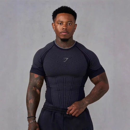Herren nan muskelmodellierendes Funktionsshirt mit 3D-Struktur und gezielten Kompressionszonen Nord Taschen