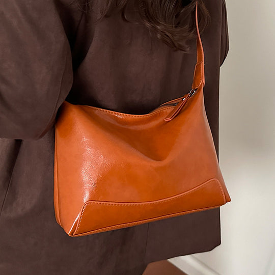 Damen Umhängetasche aus hochwertigem Leder mit modernem Reißverschluss Nord Taschen