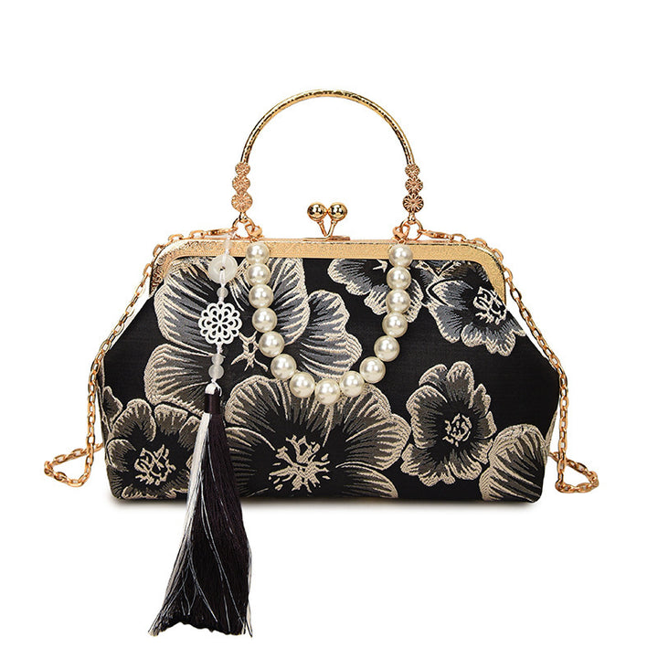 Damen elegante Abendtasche mit floralem Design und attraktiver Kettenakzent Nord Taschen