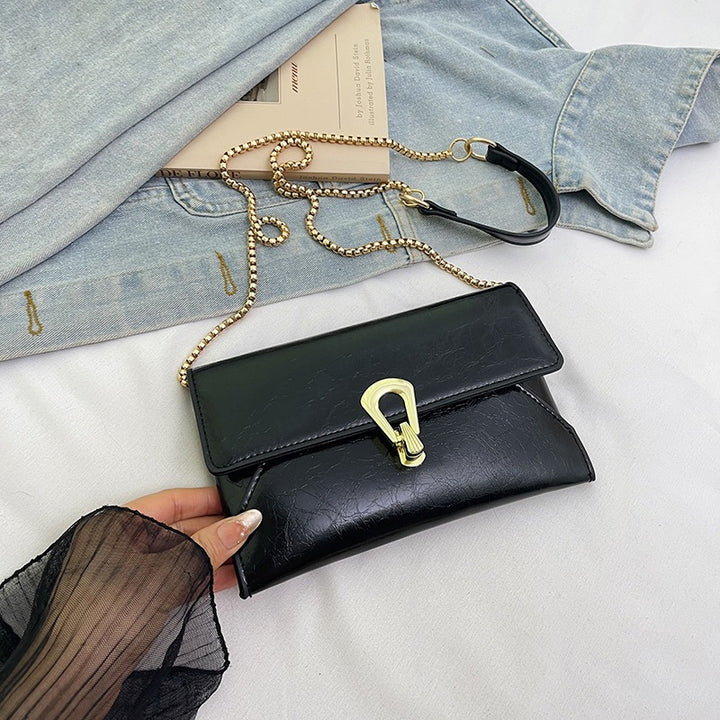 Damen elegante Handtasche im zeitlosen Design mit metallischen Akzenten Nord Taschen