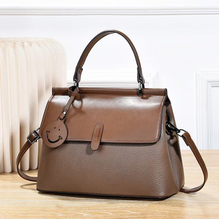 Damen Handtasche mit einzigartigem Smileymotiv und praktischem Schulterriemen Nord Taschen