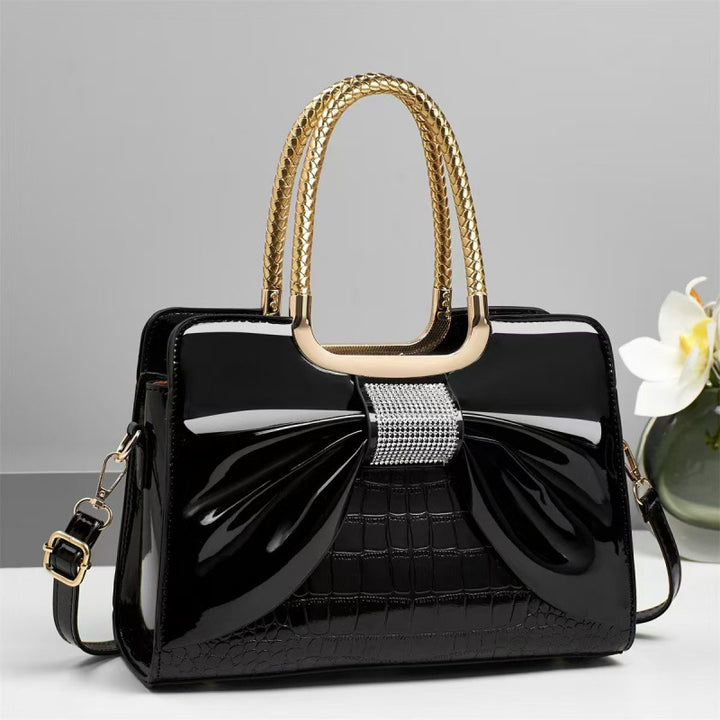 Damen Designer-Handtasche mit schimmerndem Schleifenakzent Nord Taschen