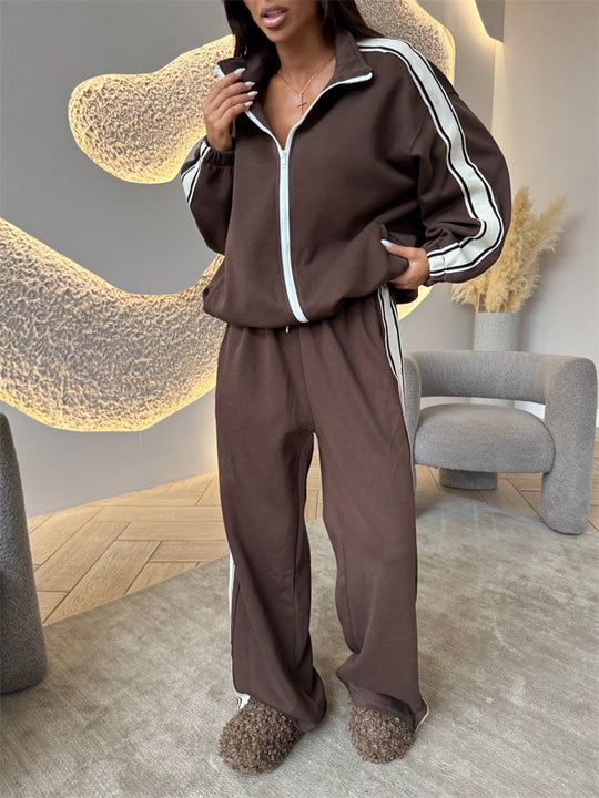 Damen weiches Oversize-Zweiteiler Trainingsset mit Reißverschlussjacke und weiter hochgeschnittener Jogginghose mit Kontraststreifen Nord Taschen