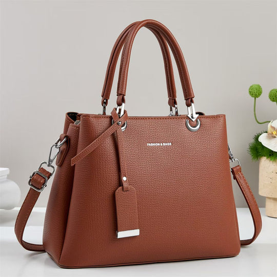 Damen elegante Handtasche mit strukturierten Akzenten Nord Taschen