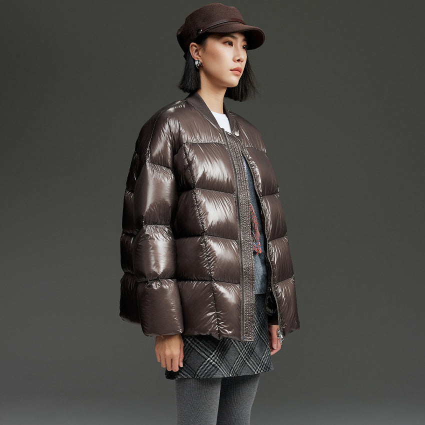 Damen Kurze gestepptte Daunenjacke mit glänzender Shell und Boxy-Silhouette Nord Taschen