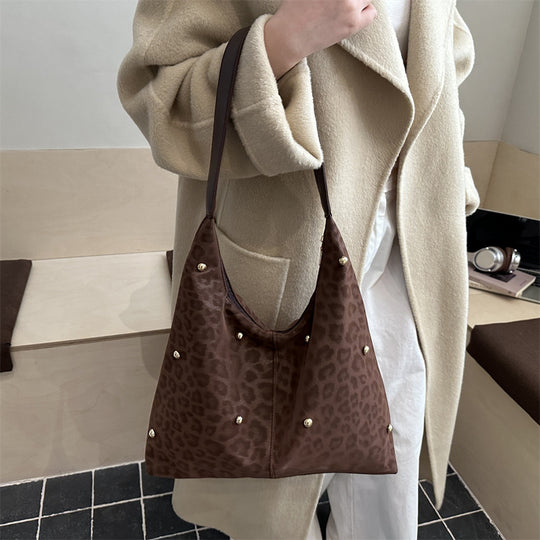 Damen Hobo-Tasche mit elegantem Leopardenmuster und goldenen Akzenten Nord Taschen