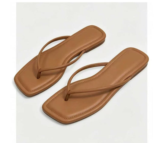 Damen Elegante und flache Zehentrenner mit minimalistischen Riemen
