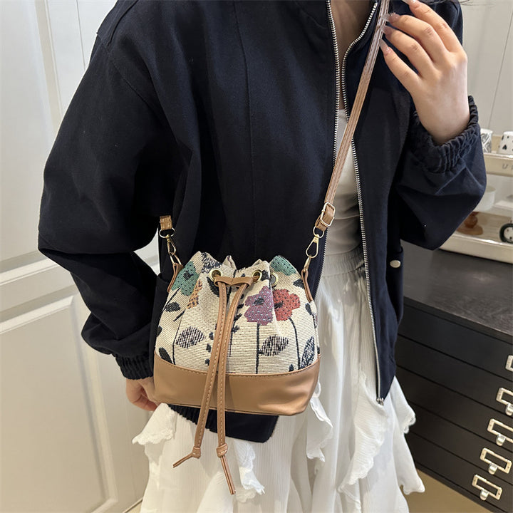 Damen Beuteltasche mit floralem Muster und Lederboden Nord Taschen