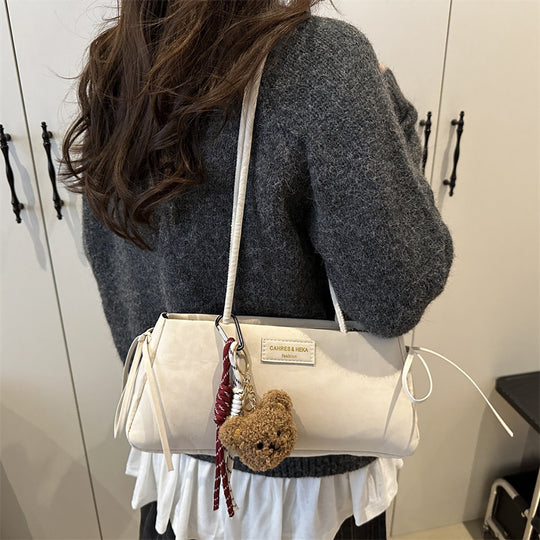 Damen elegante Clutch-Tasche mit verspieltem Anhänger Nord Taschen