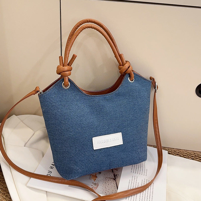 Damen Handtasche aus strapazierfähigem Denim mit eleganten Lederdetails Nord Taschen