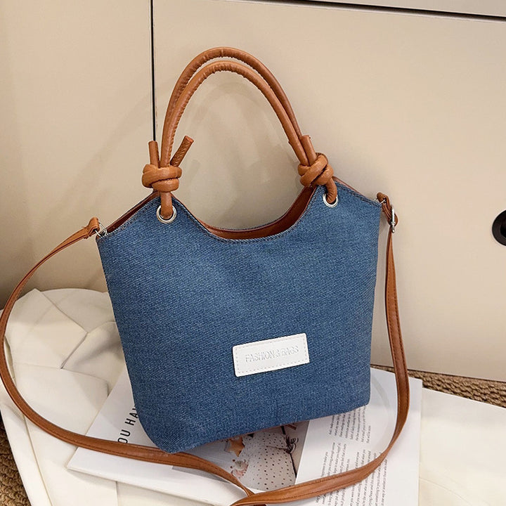 Damen Handtasche aus strapazierfähigem Denim mit eleganten Lederdetails Nord Taschen