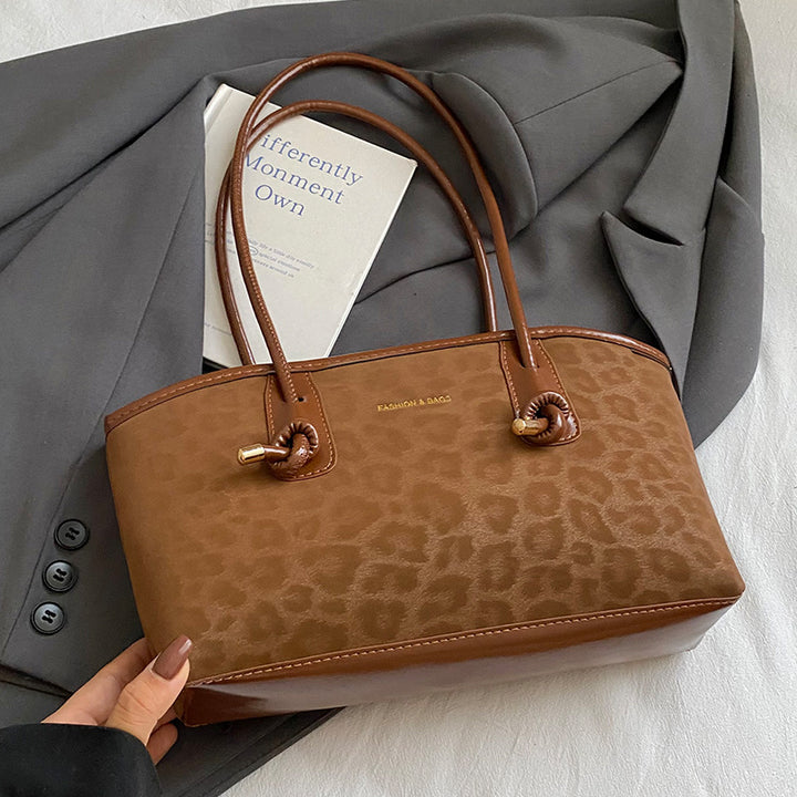 Damen Handtasche mit elegantem Leo-Design und praktischem Innenfach Nord Taschen